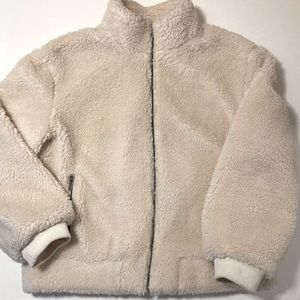Fluffy furry polar bear coat in off white.